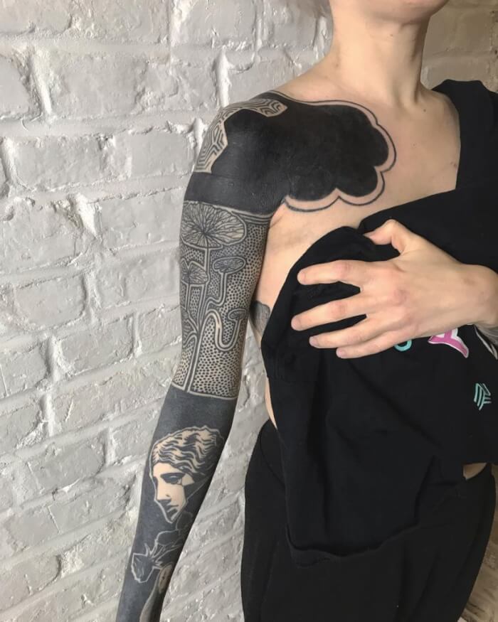 Take A Look At This Collection Of Captivating Solid Black Tattoos - 167
