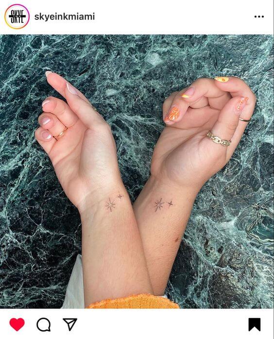 matching star tattoos