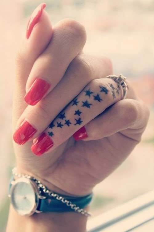 finger star tattoo