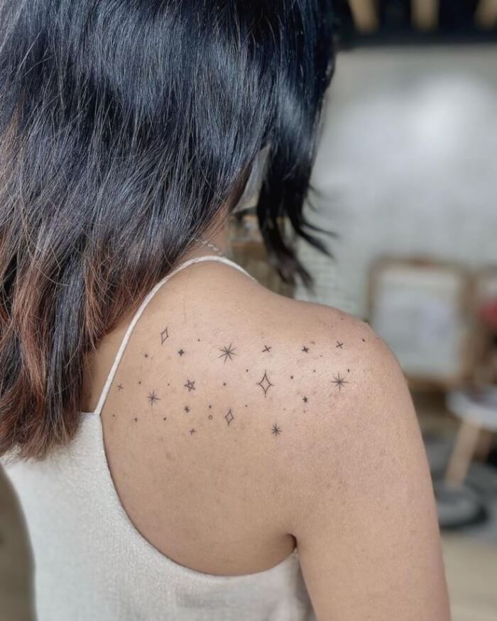 star tattoo on shoulder