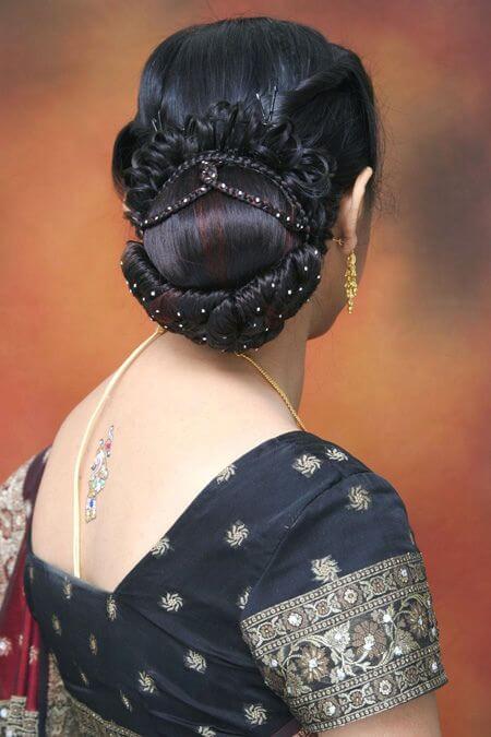 Voluminous Indian Updo with a Polished Finish