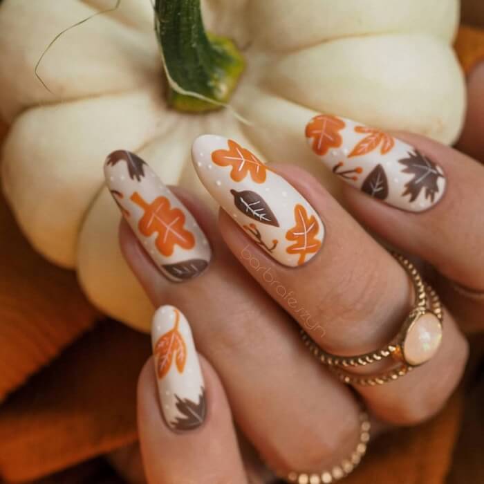 Light Brown Manicure With Orange Details