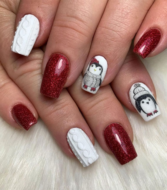 White Sweater, Penguin, and Shimmery Red Christmas Nails