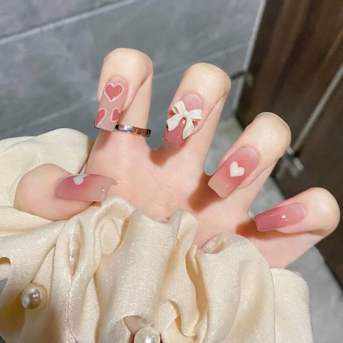 Pink And White Nails With Hearts