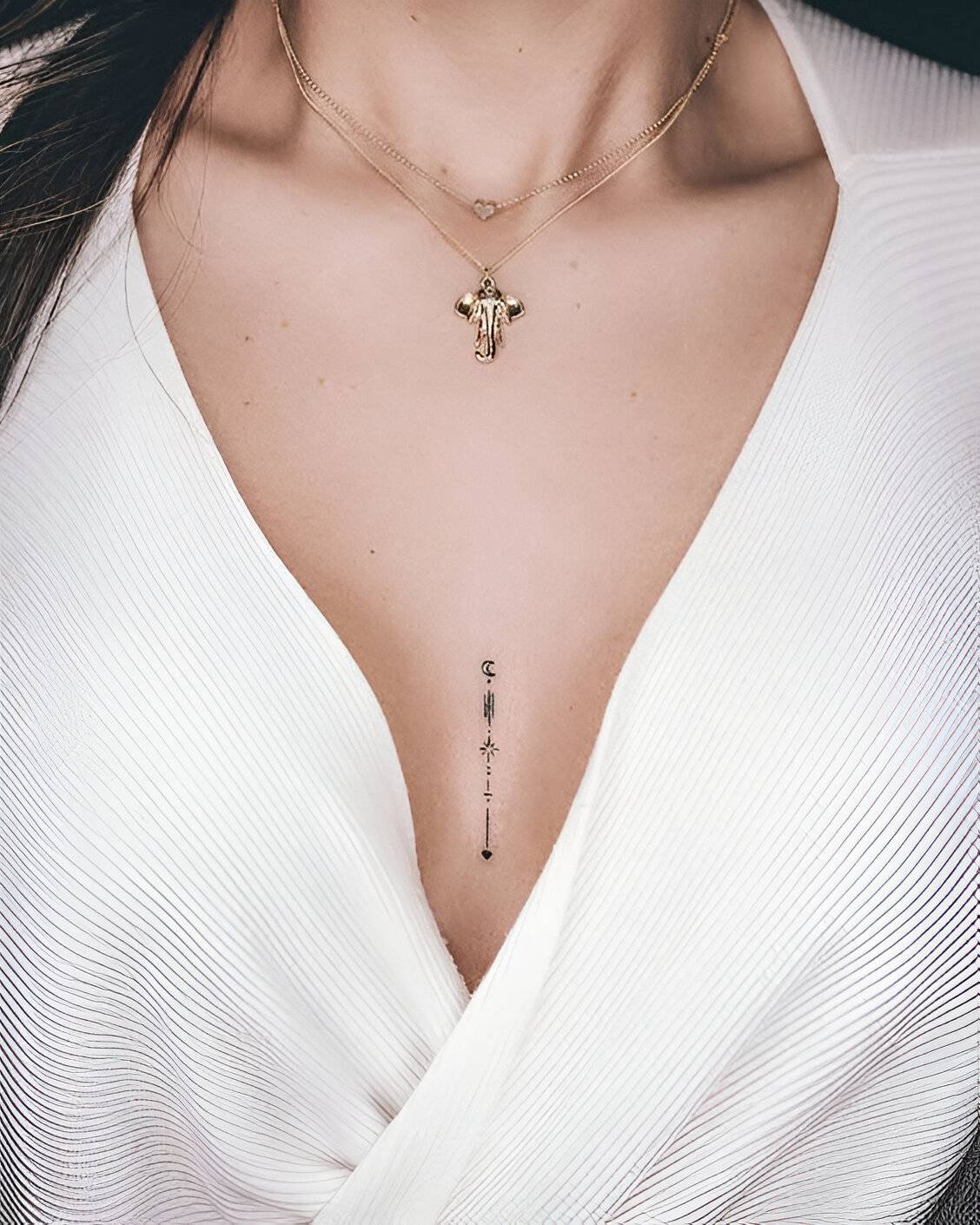 27 Elegant Chest Tattoos For Women To Elevate Their Beauty 13