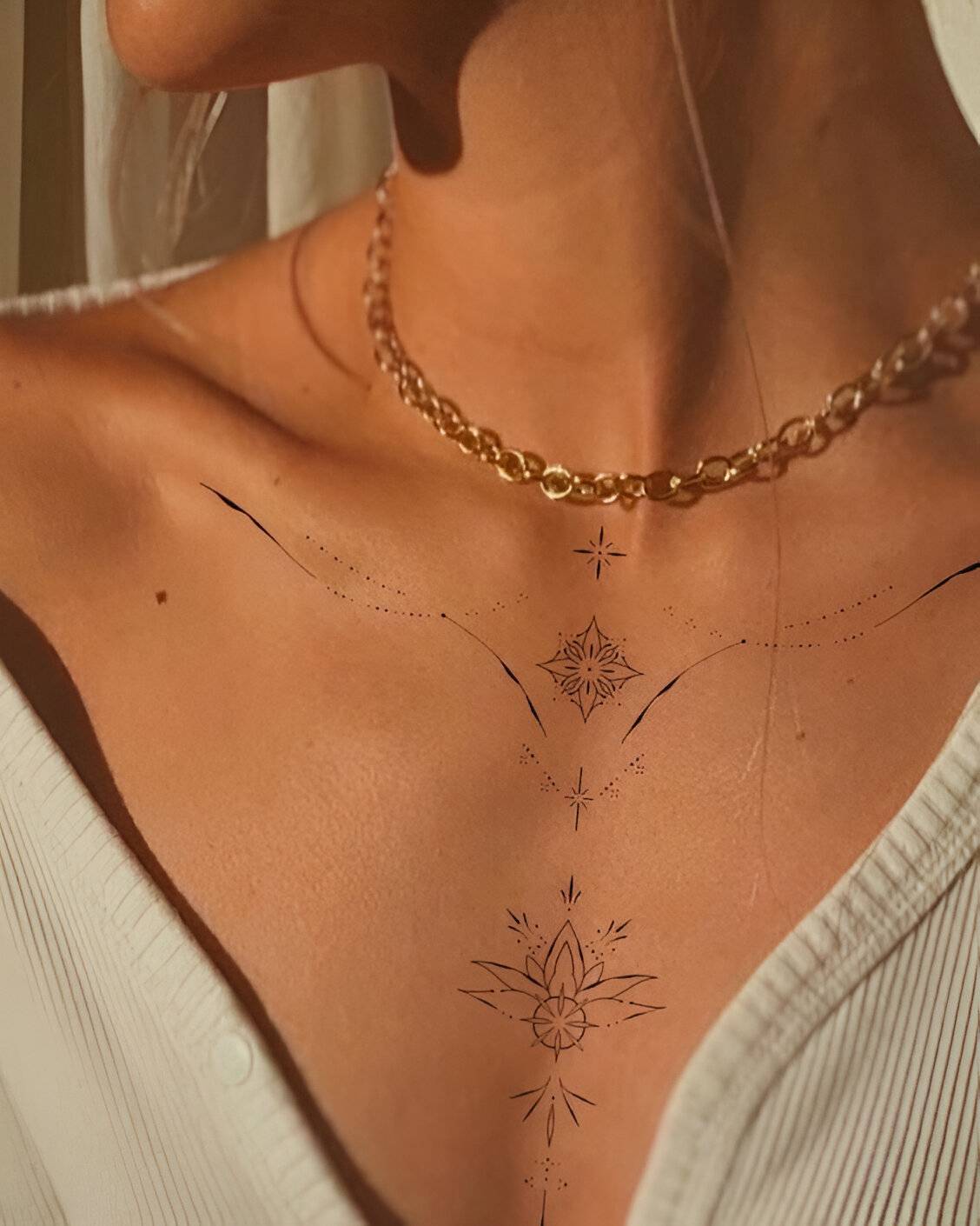 27 Elegant Chest Tattoos For Women To Elevate Their Beauty 6