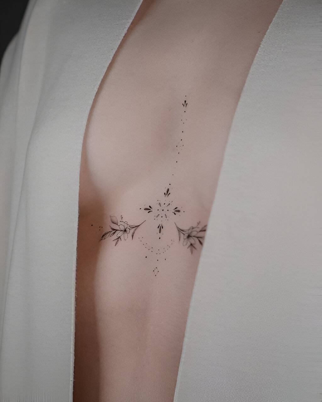 27 Elegant Chest Tattoos For Women To Elevate Their Beauty 9