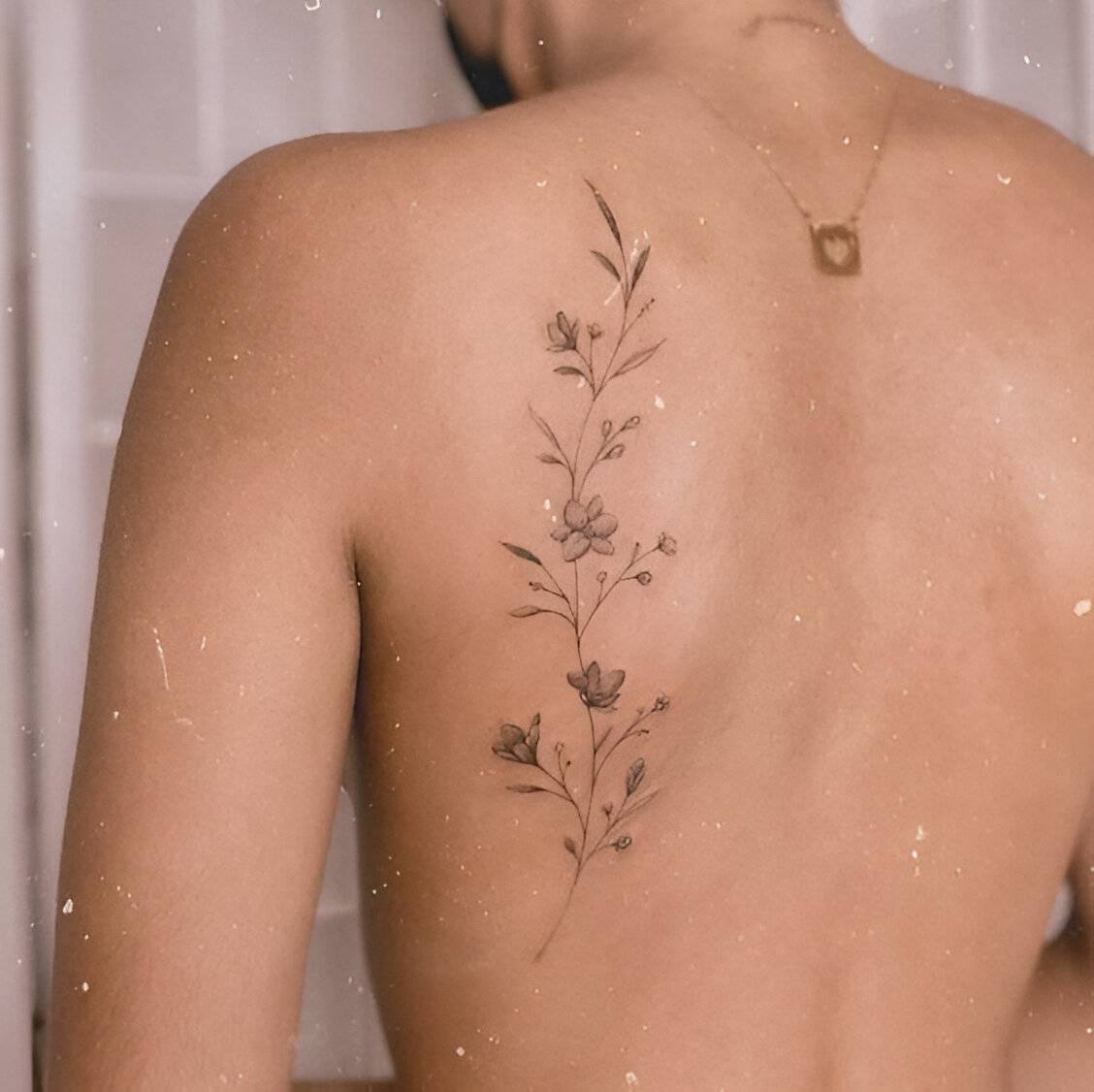 Simple Floral Back Tattoo
