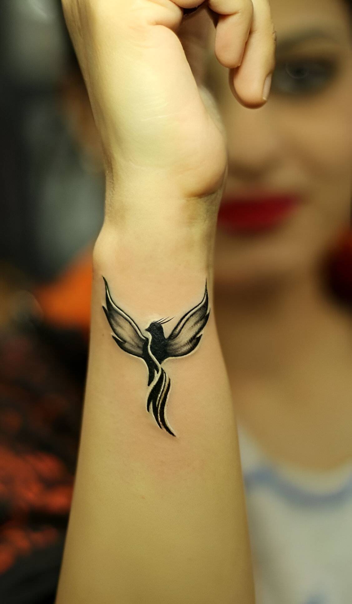 Wrist Phoenix Tattoos
