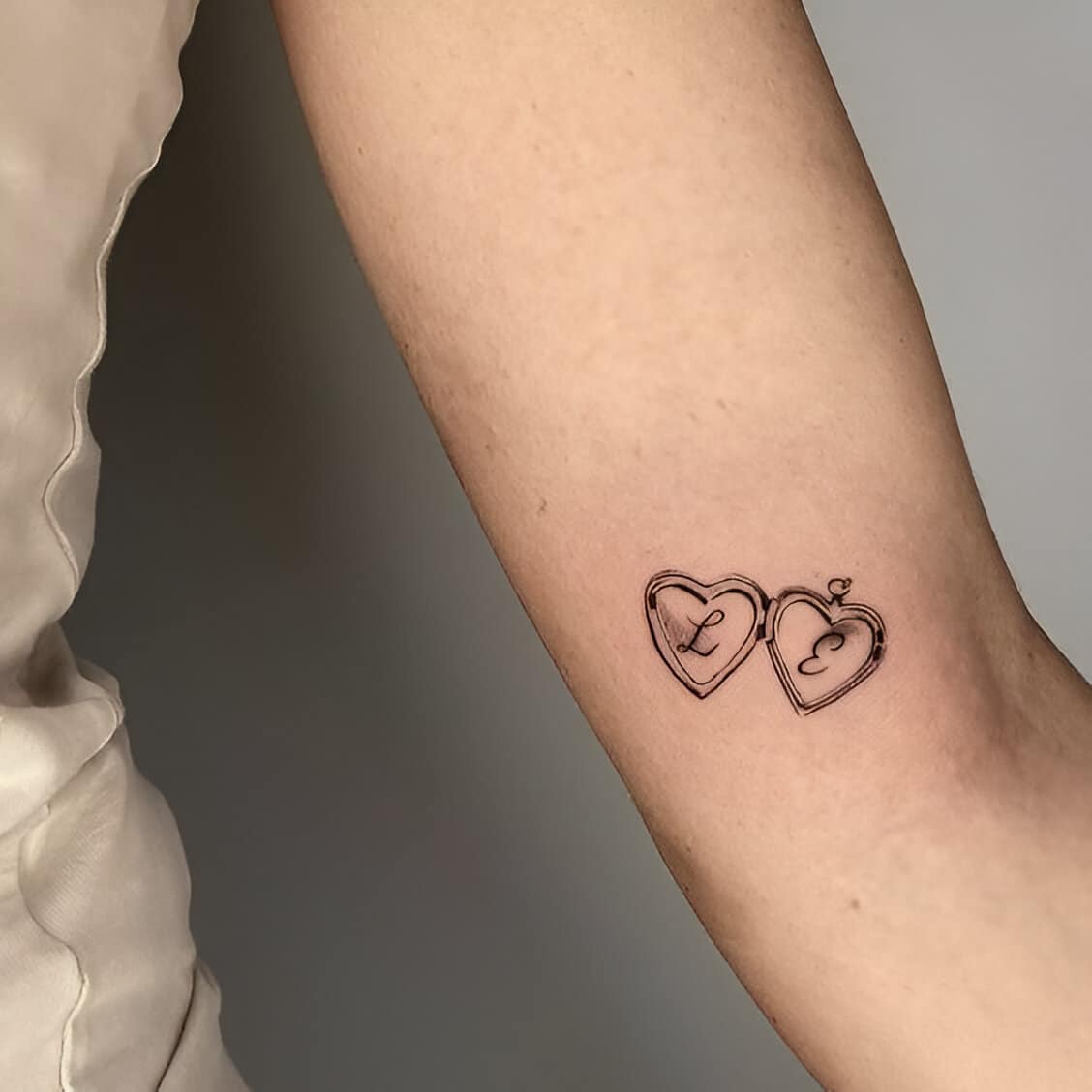 30 Elegant Matching Heart Tattoos To Get With Your Partner ASAP 10
