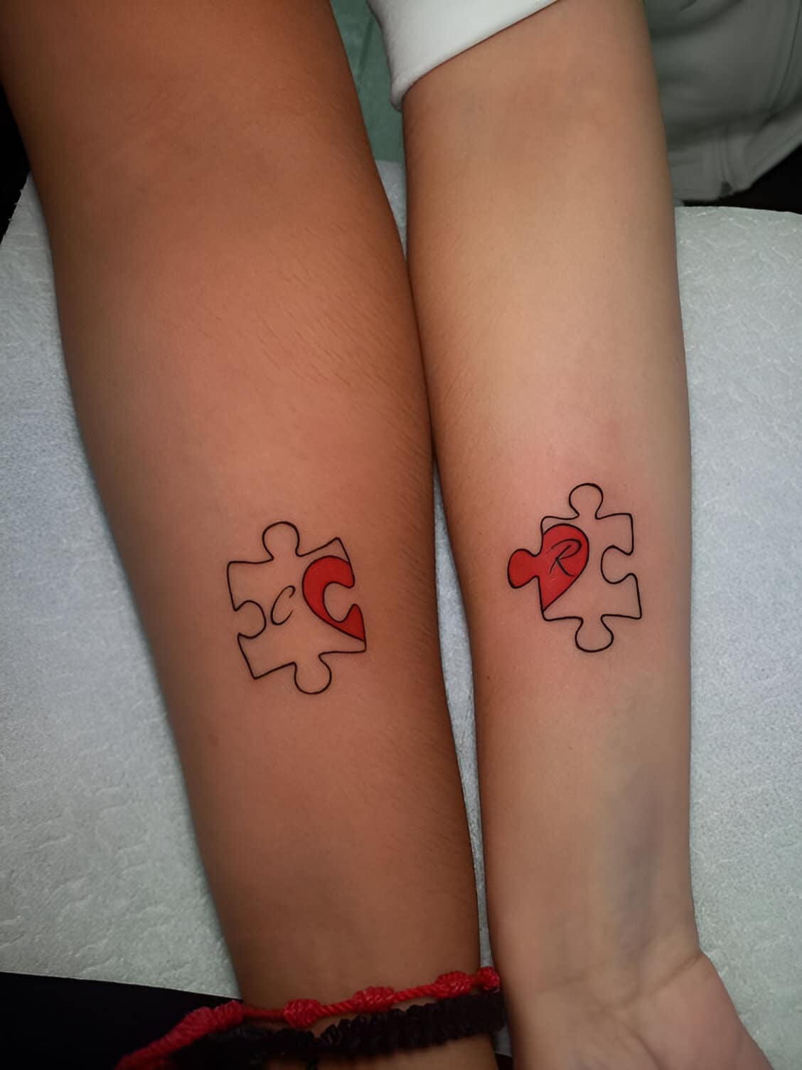 30 Elegant Matching Heart Tattoos To Get With Your Partner ASAP 7