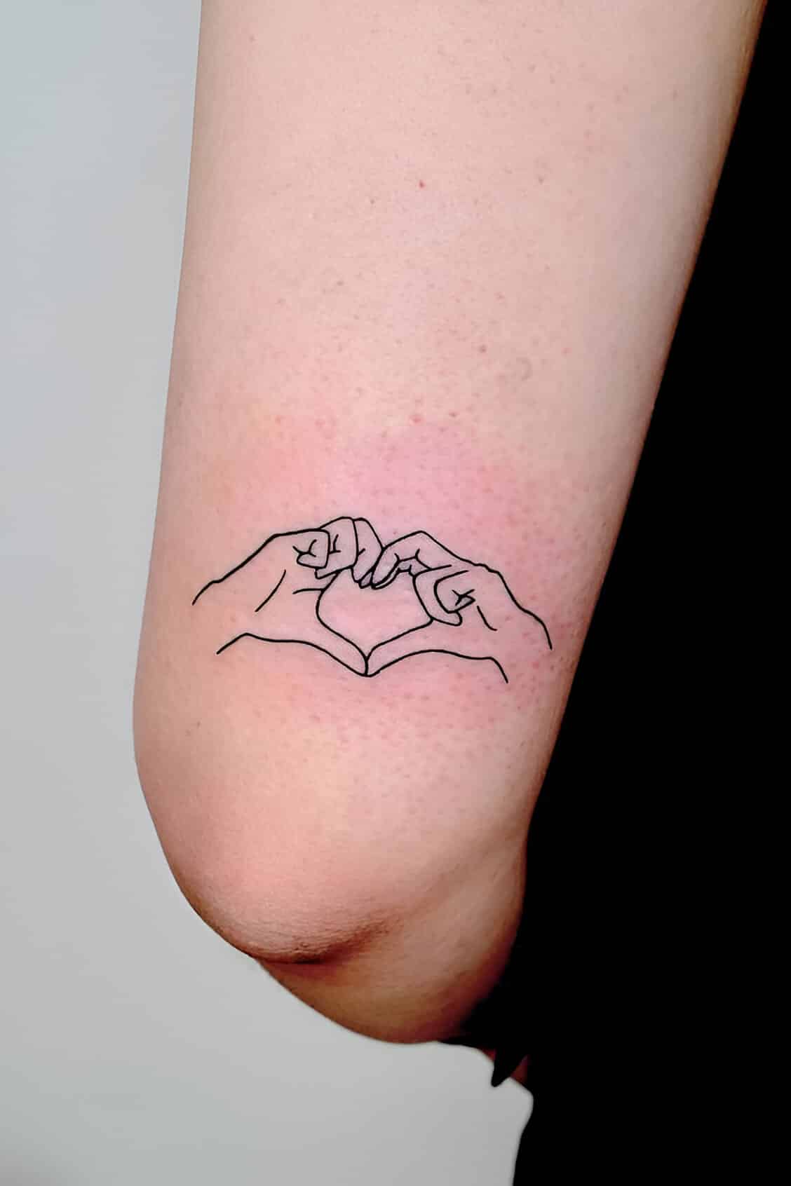 30 Elegant Matching Heart Tattoos To Get With Your Partner ASAP 9