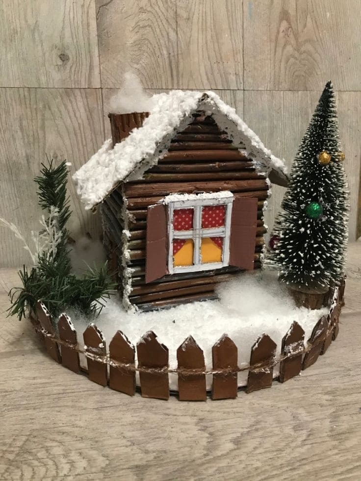 Cozy Snowy Cardboard Cabin Display