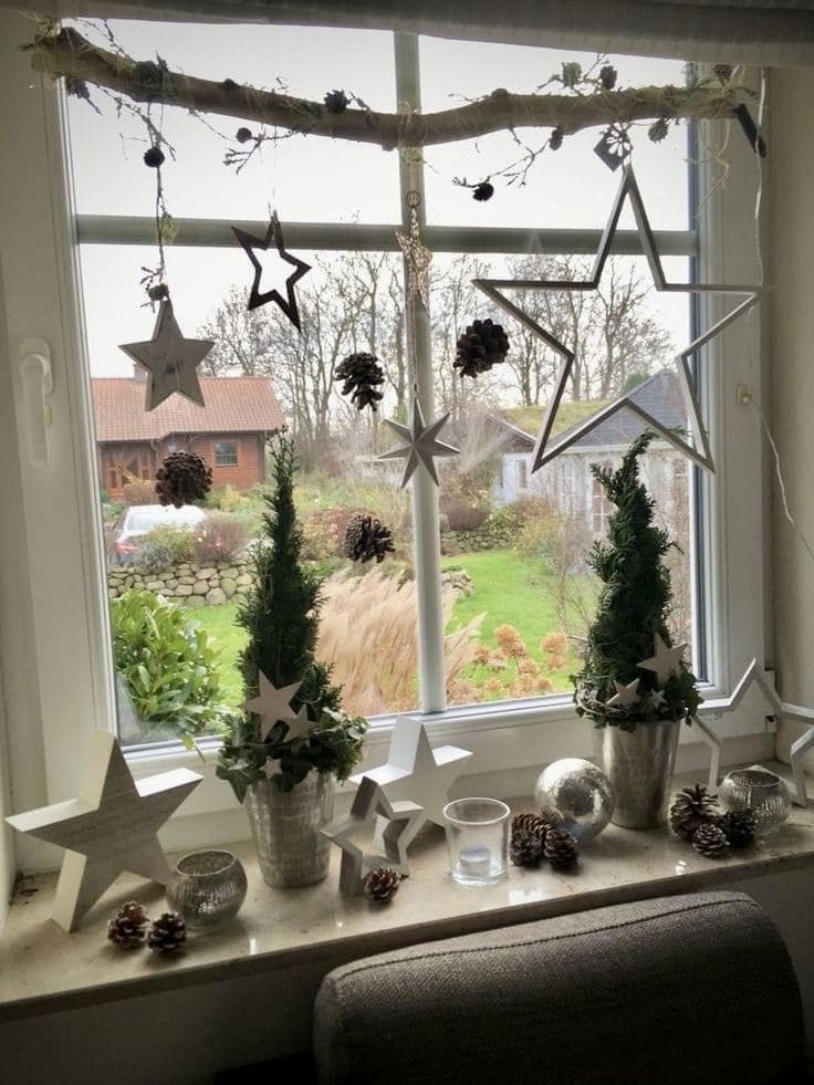 Whimsical Window Display with Stars and Pinecones