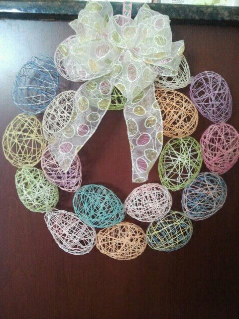 Colorful Yarn Egg Wreath with Festive Bow