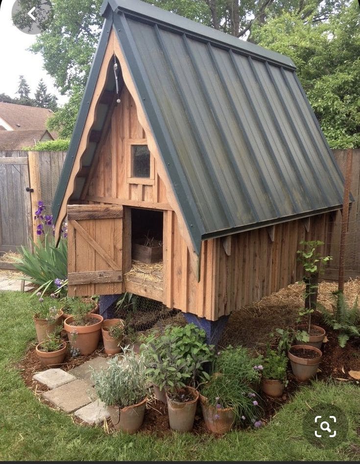 A-Frame Chicken Coop with Elegant Garden Accents