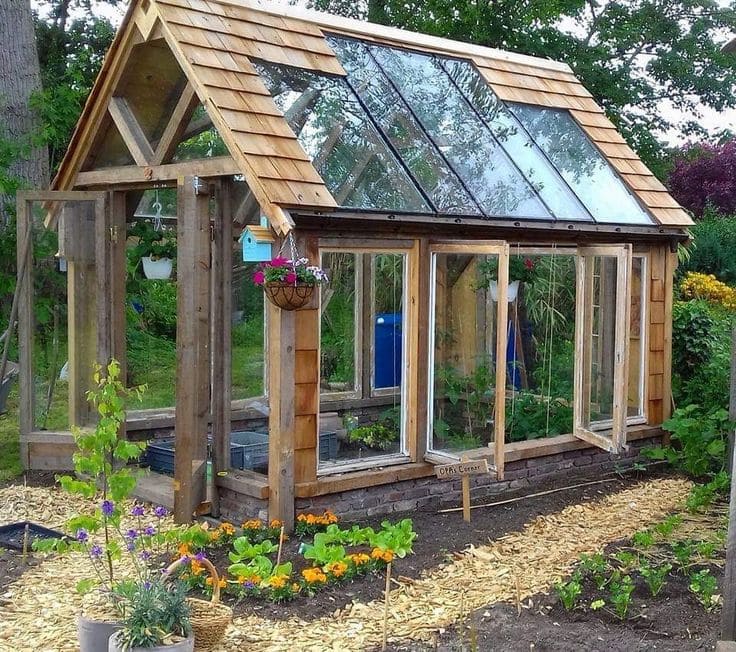 Cedar-Framed Greenhouse with Salvaged Windows Design