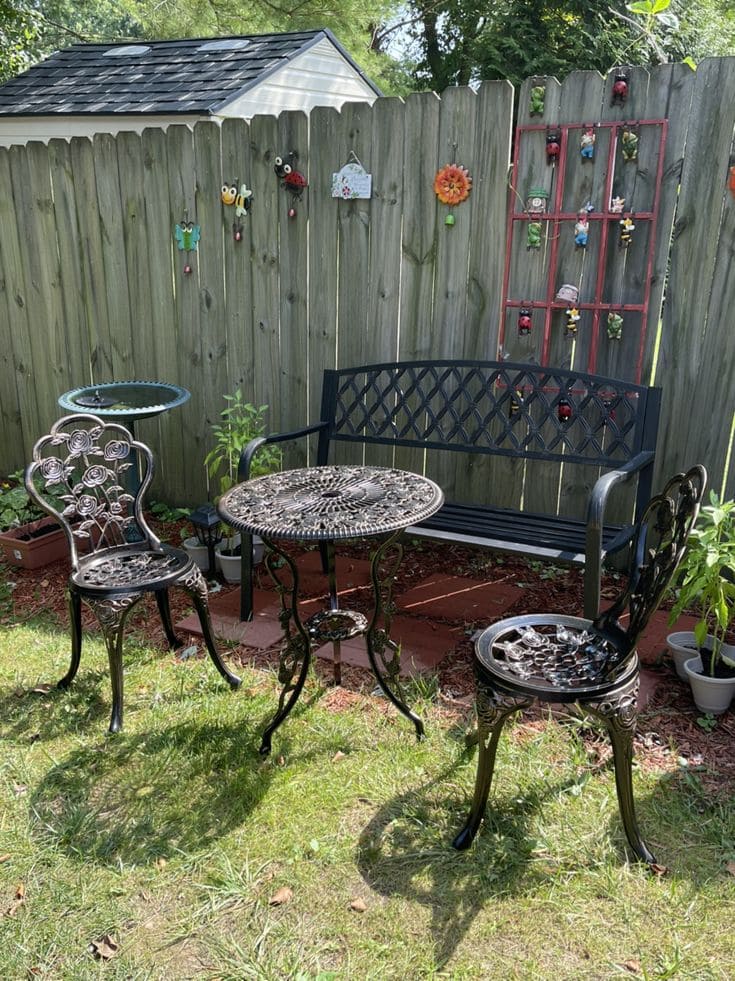 Charming Garden Nook with Ornate Furniture