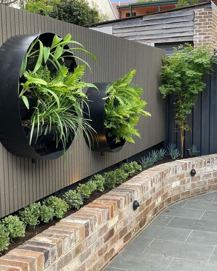 Contemporary Vertical Planters with Curved Brick Design