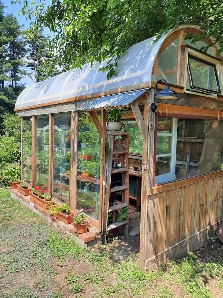 Curved-Roof Rustic Greenhouse With Reclaimed Materials