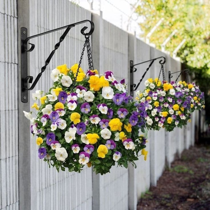 Elegant Hanging Flower Baskets on Metal Brackets