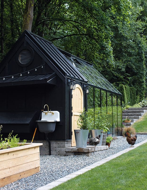 Luxurious Black-Wood Greenhouse With Industrial Sink Setup