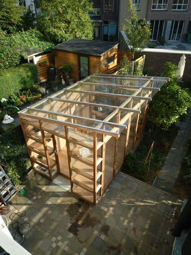 Modern Transparent Rooftop Greenhouse with Wooden Frame