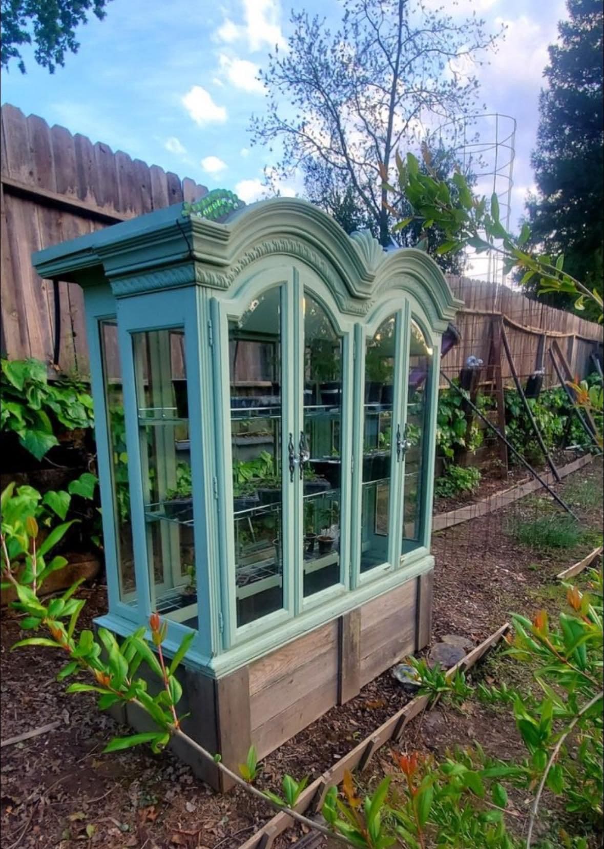 Repurposed Cabinet Greenhouse for Stylish Gardening