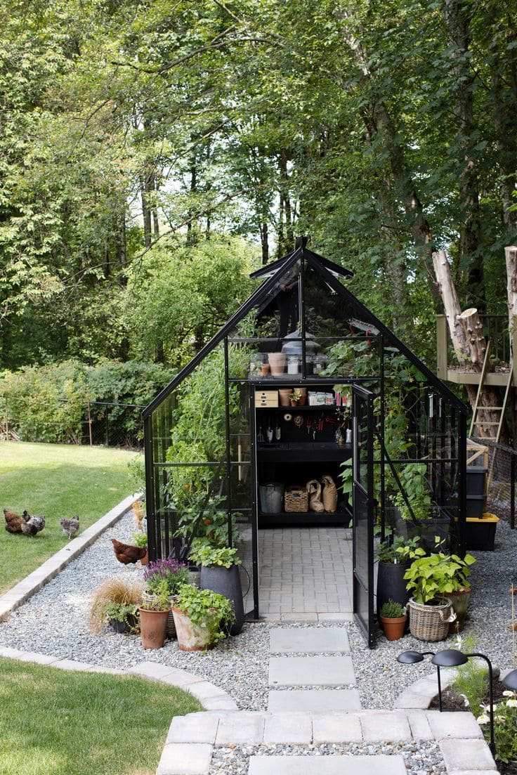 Sleek Black-Framed Greenhouse with Modern Elegance