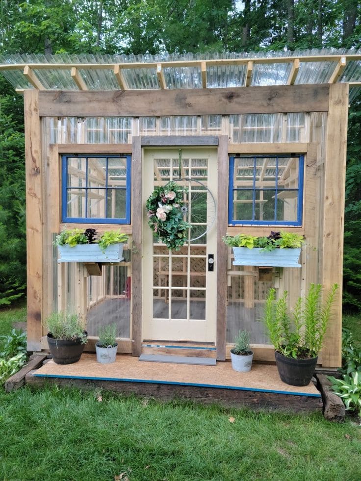 Wooden Greenhouse with Stylish Floral Accents