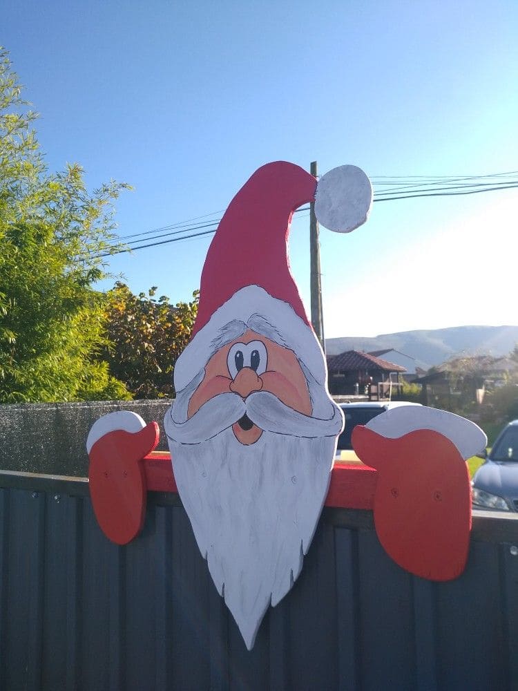 Playful Wooden Santa Fence Decoration